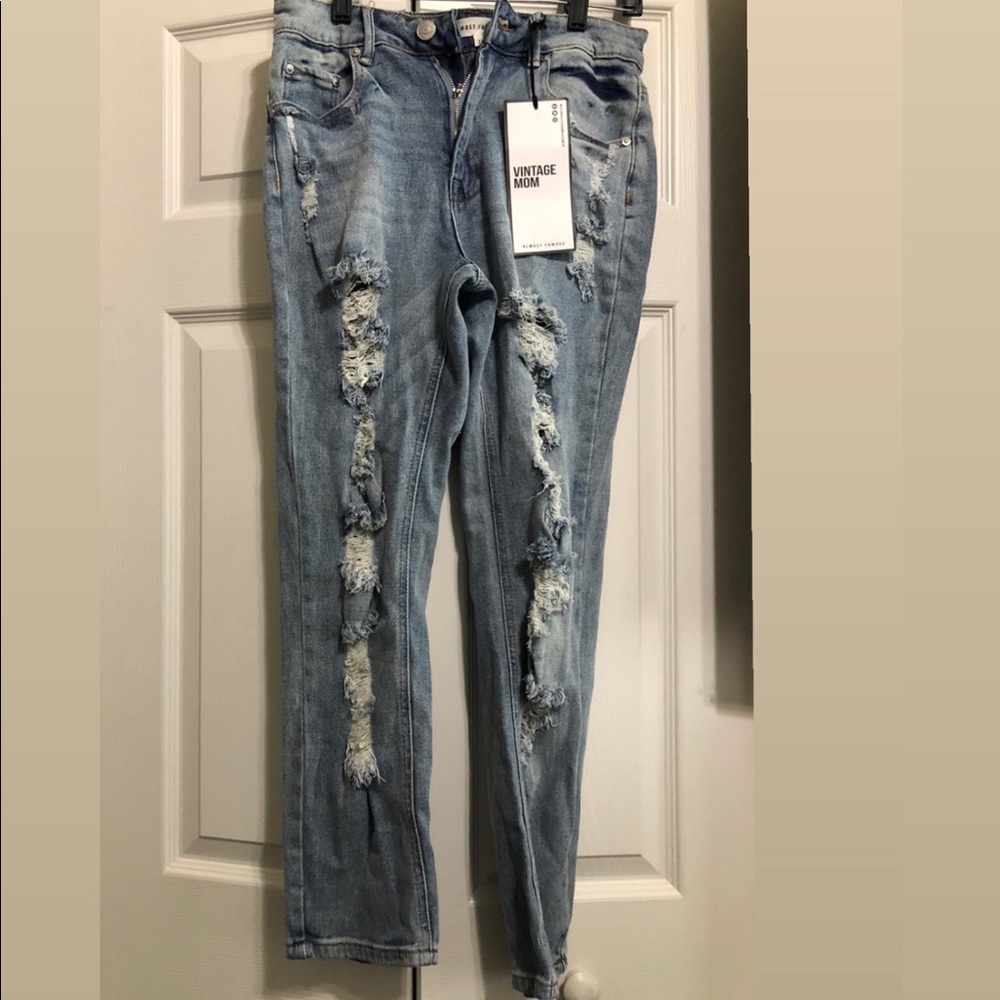 brand new distressed jeans